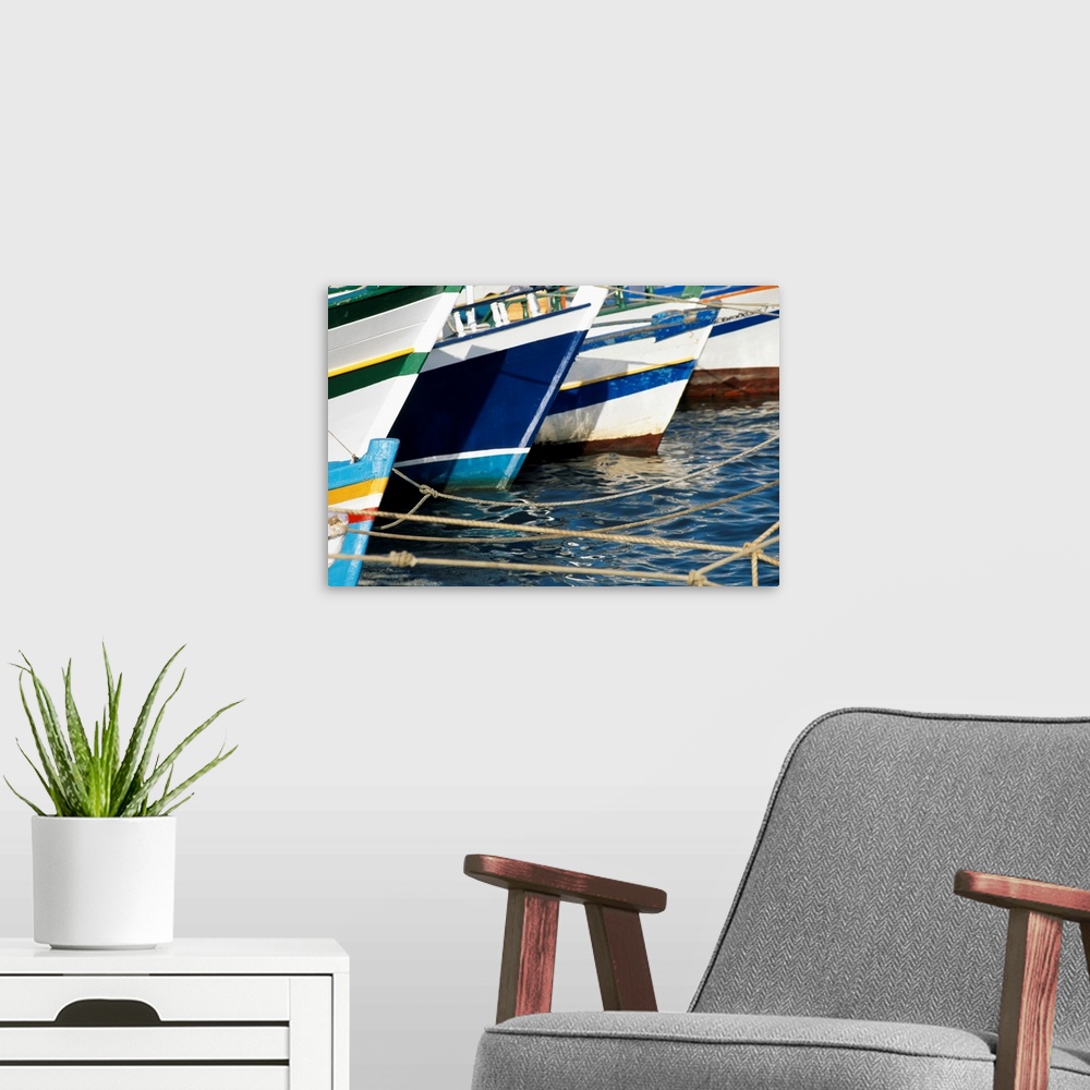A modern room featuring Fishing Boats In Harbour