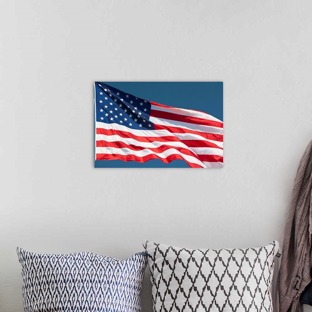 A bohemian room featuring Flag Of The United States Of America
