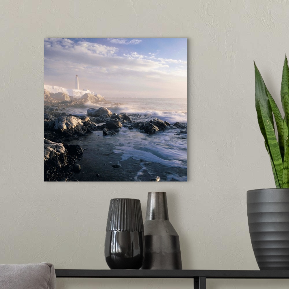 A modern room featuring Fog And Rocky Shoreline In Winter With Cap Des Rosiers Lighthouse, Quebec, Canada