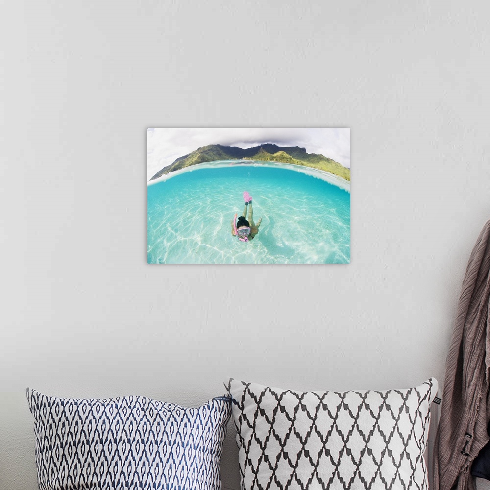 A bohemian room featuring French Polynesia, Moorea, Woman Free Diving In Turquoise Ocean