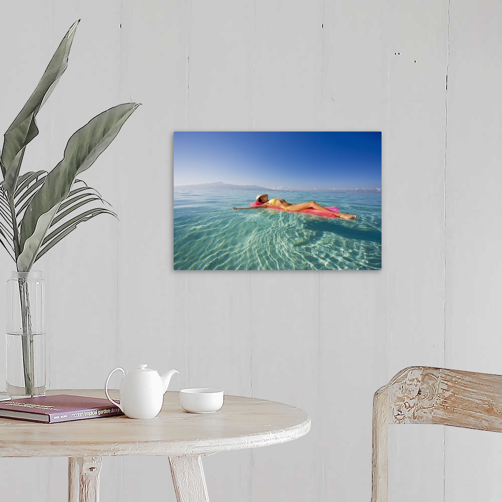 A farmhouse room featuring French Polynesia, Tahiti, Moorea, Woman Floating In Water