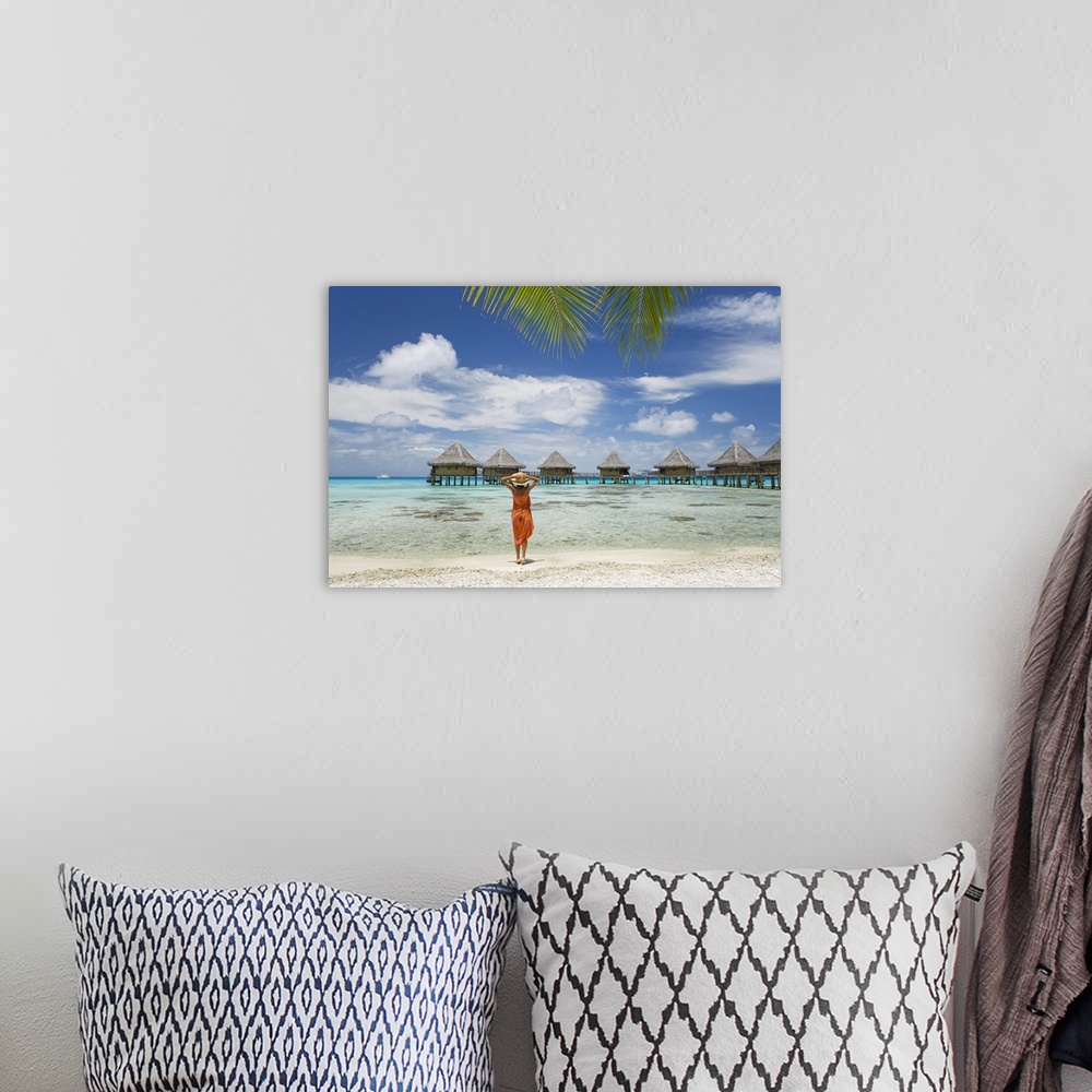 A bohemian room featuring French Polynesia, Tuamotu Islands, Rangiroa Atoll, Woman On Beach Near Luxury Resort