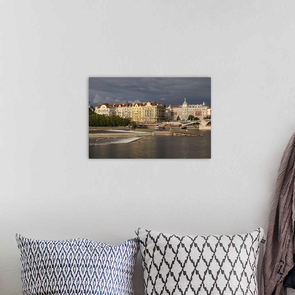 A bohemian room featuring From the Vltava River, a view of The Old Town in Prague. Old Town, Prague, Czech Republic