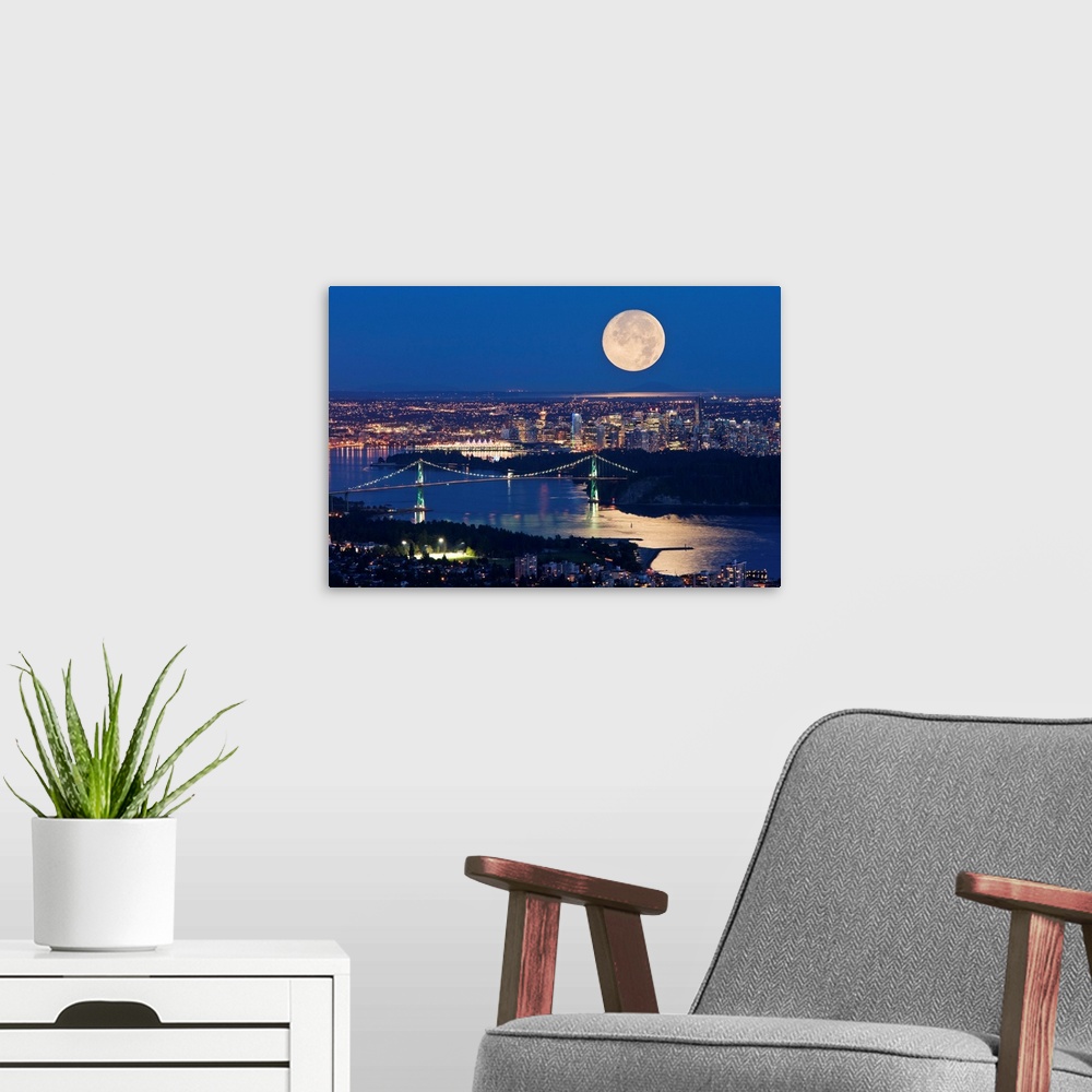 A modern room featuring Full Moonrise Over Vancouver, British Columbia, Canada