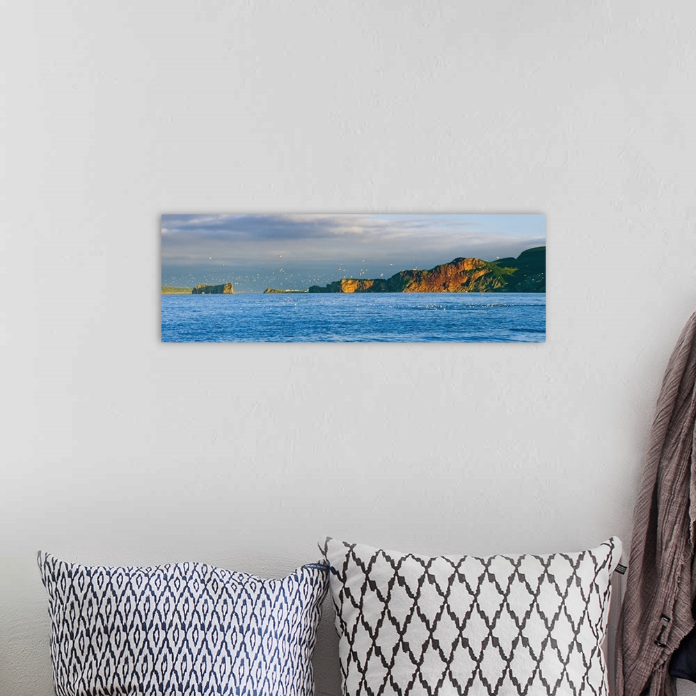 A bohemian room featuring Gannets In Flight And Perce Rock From Barachois, Gaspesie, Quebec, Canada