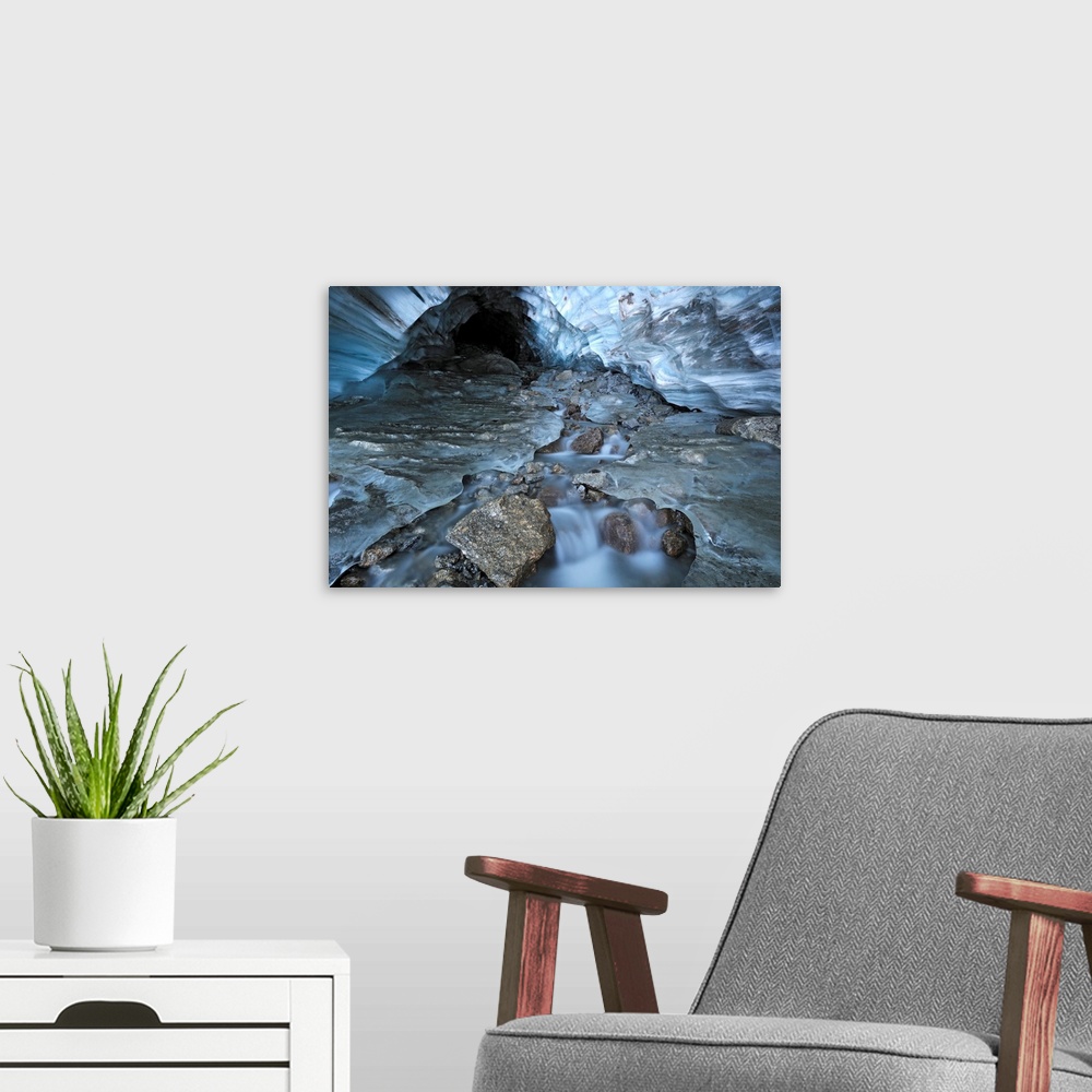 A modern room featuring Glacial Creek Flowing From Blue Ice Cave In Britnell Glacier, Canada