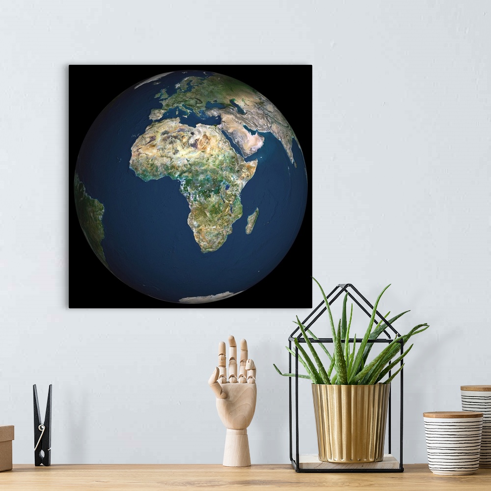 A bohemian room featuring Globe Africa, True Colour Satellite Image. Earth. True colour satellite image of the Earth, centr...