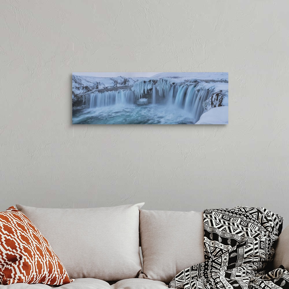 A bohemian room featuring Godafoss With Large Pieces Of Ice Forming In The Cold Weather, Iceland