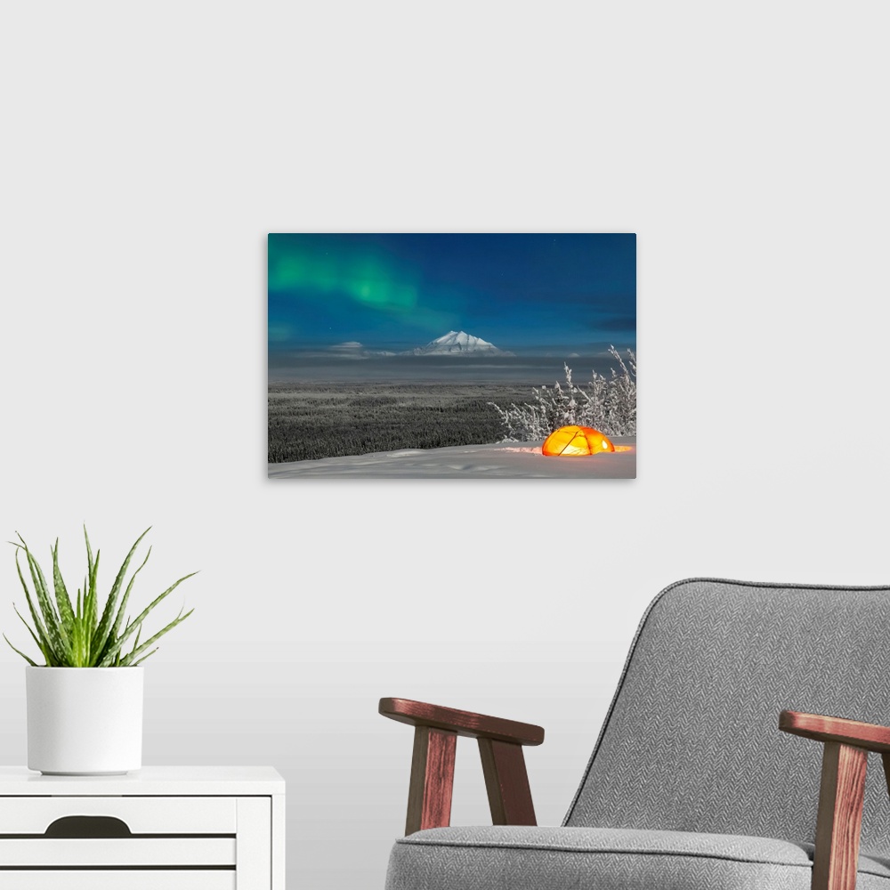 A modern room featuring Green Aurora Borealis shines above moonlight casting light on Mount Drum and the Copper River Val...