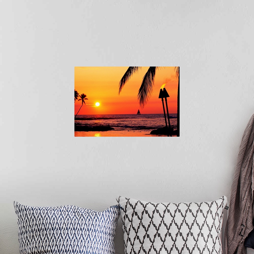 A bohemian room featuring This is a landscape photograph of the sun setting on a tropical beach where all the landscape fea...