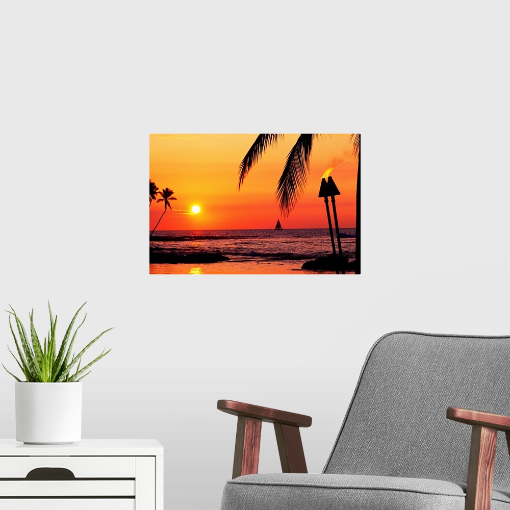 A modern room featuring This is a landscape photograph of the sun setting on a tropical beach where all the landscape fea...