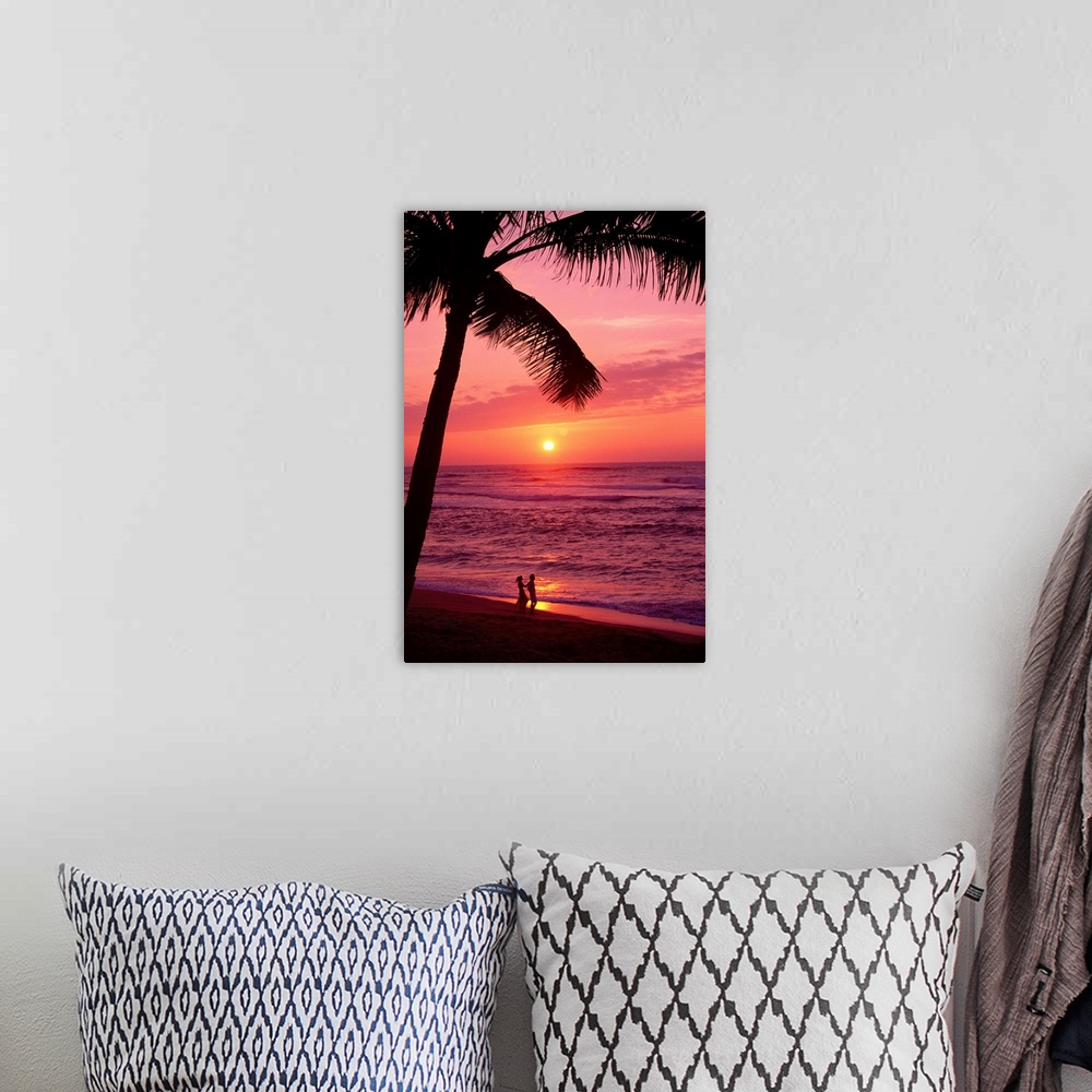 A bohemian room featuring Hawaii, Couple Silhouetted On The Beach At Sunset With Tall Palm Foreground