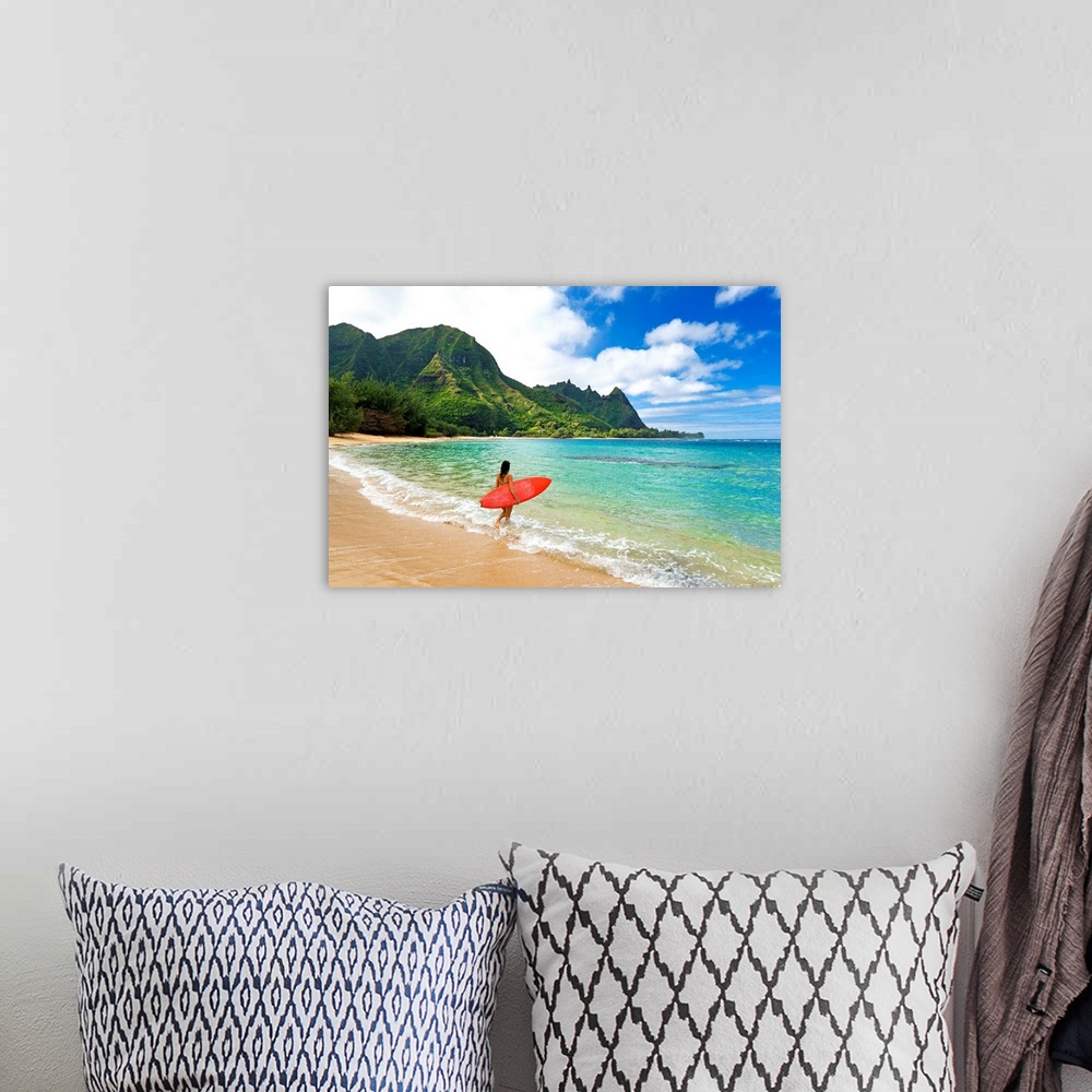 A bohemian room featuring Hawaii, Kauai, Haena Beach, Woman Entering Ocean With Surfboard