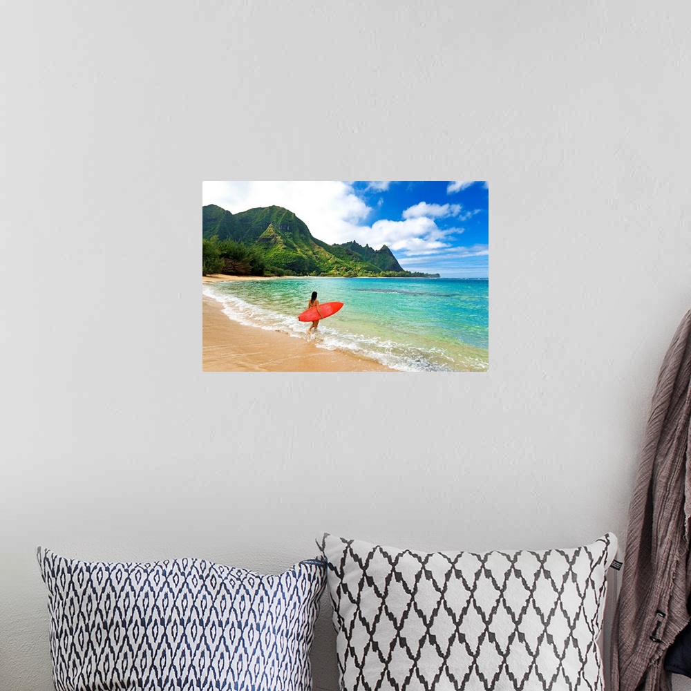 A bohemian room featuring Hawaii, Kauai, Haena Beach, Woman Entering Ocean With Surfboard
