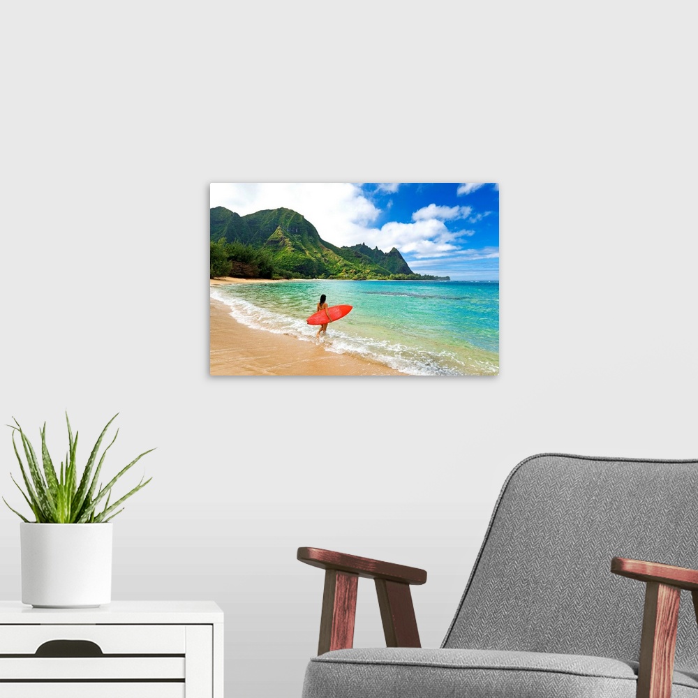 A modern room featuring Hawaii, Kauai, Haena Beach, Woman Entering Ocean With Surfboard