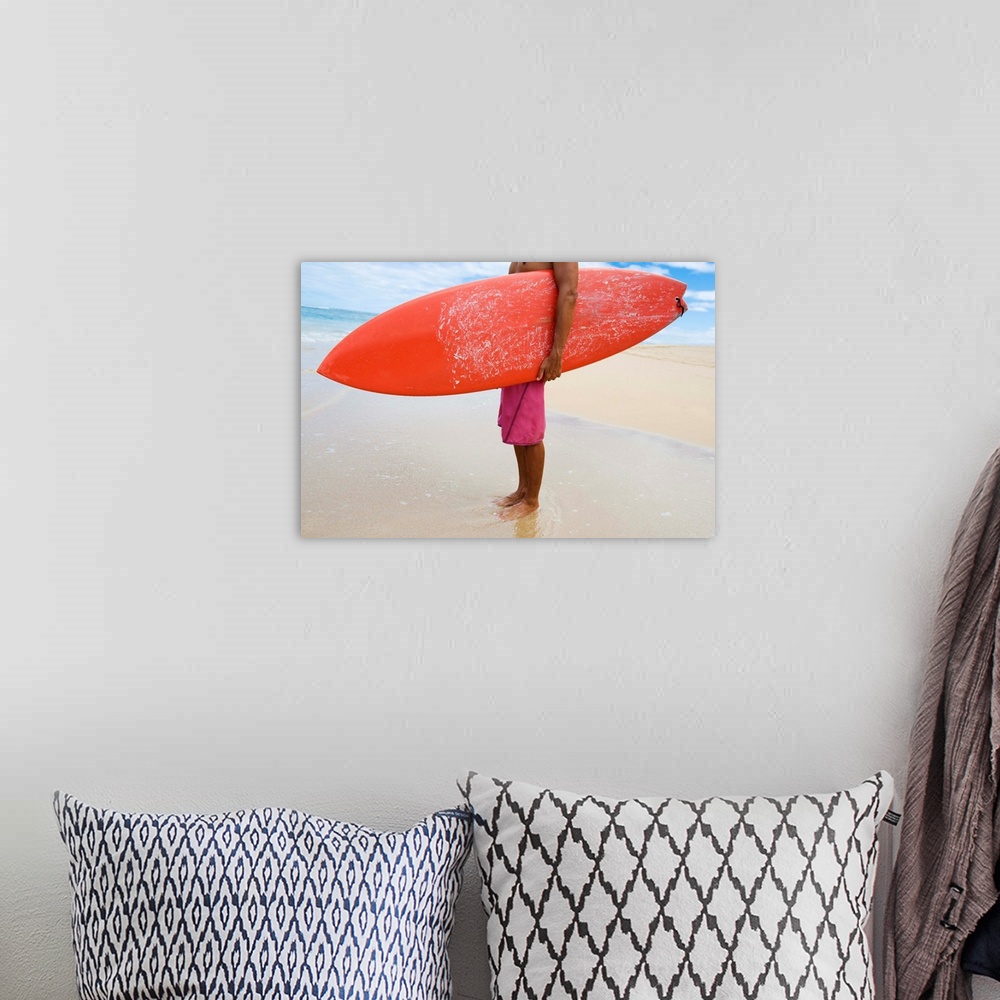 A bohemian room featuring Hawaii, Kauai, Man Holding Surfboard On Beach, View From Side