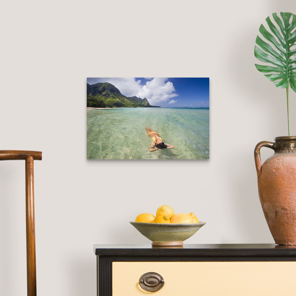 A traditional room featuring Hawaii, Kauai, Tunnels Beach, Woman Floating In The Ocean