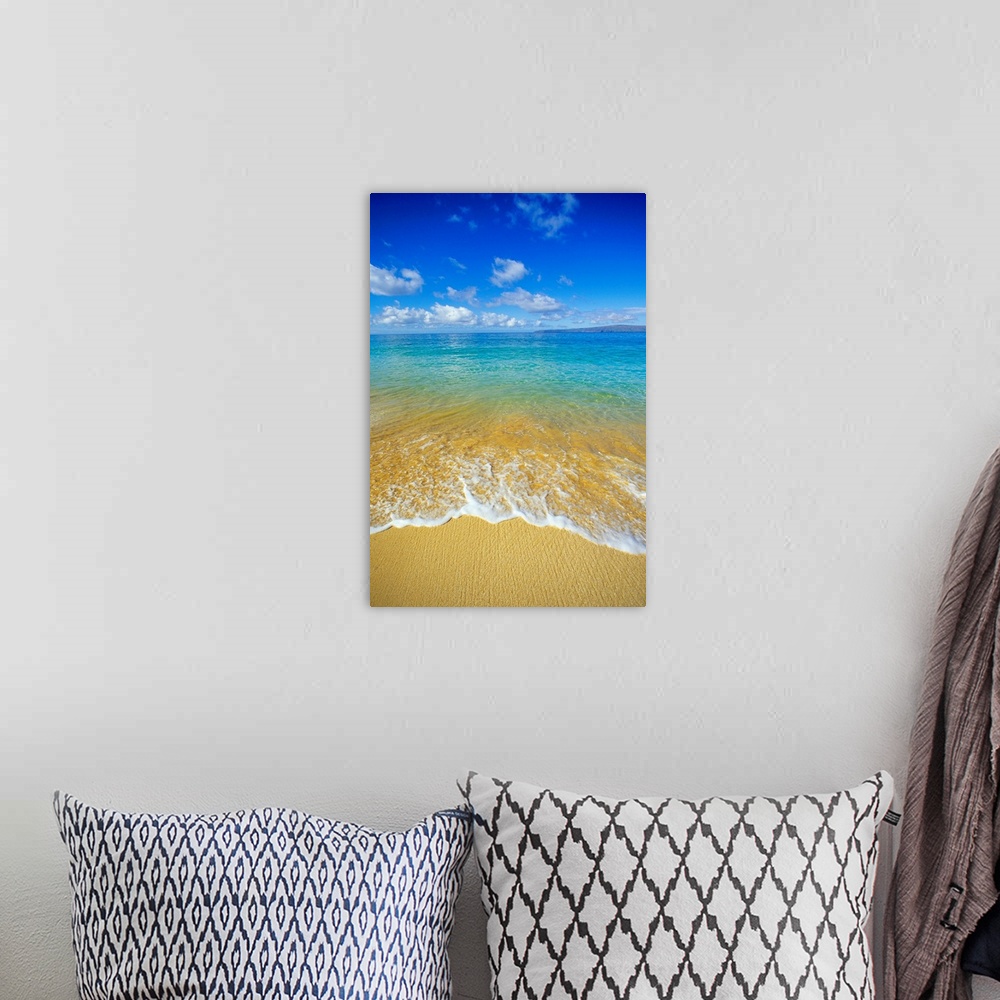 A bohemian room featuring Vertical photograph taken from the beach as water rushes upon it and a view out toward the vast c...