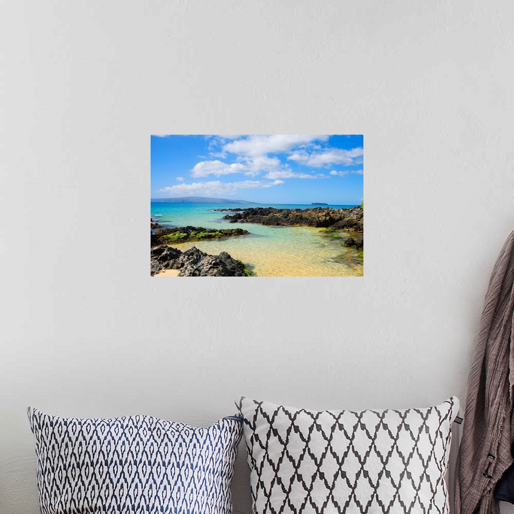 A bohemian room featuring Photograph of rocky shoreline with crystal clear water and mountains in the distance under a clou...