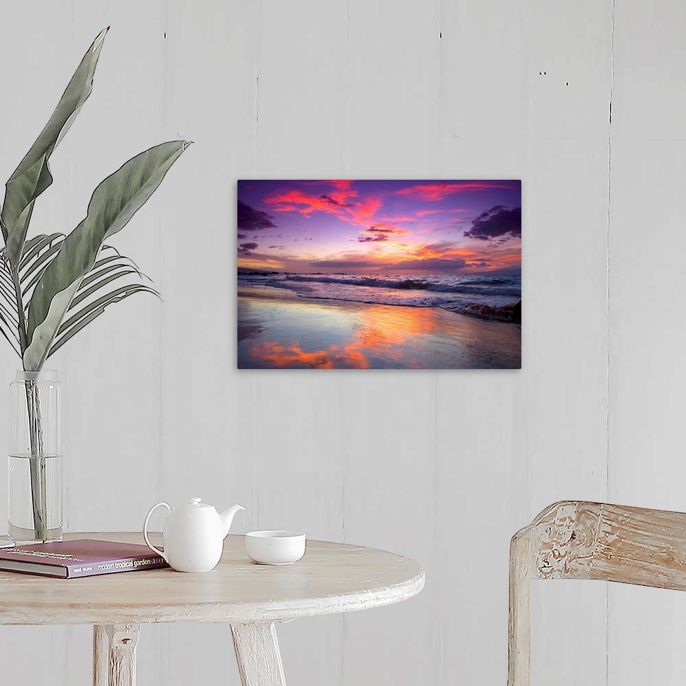 A farmhouse room featuring Large photograph of waves crashing on Maui shore  as the sun sets behind the clouds.