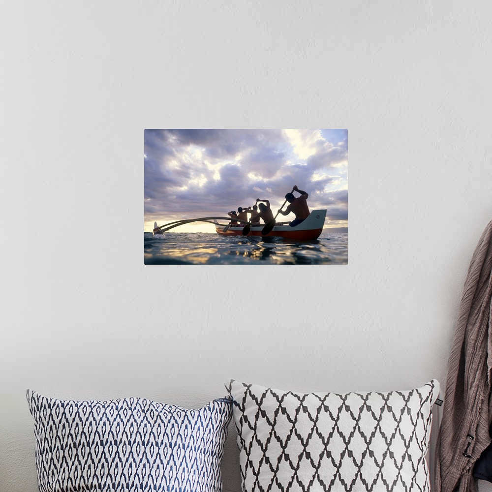 A bohemian room featuring Hawaii, Men On Outrigger Canoe Paddle Into Sunset Under Dramatic Clouds