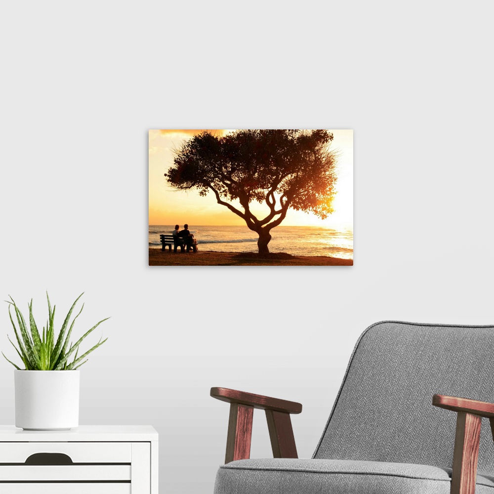 A modern room featuring Hawaii, Oahu, Beautiful Sunset Over The Ocean With A Couple Sitting On A Bench