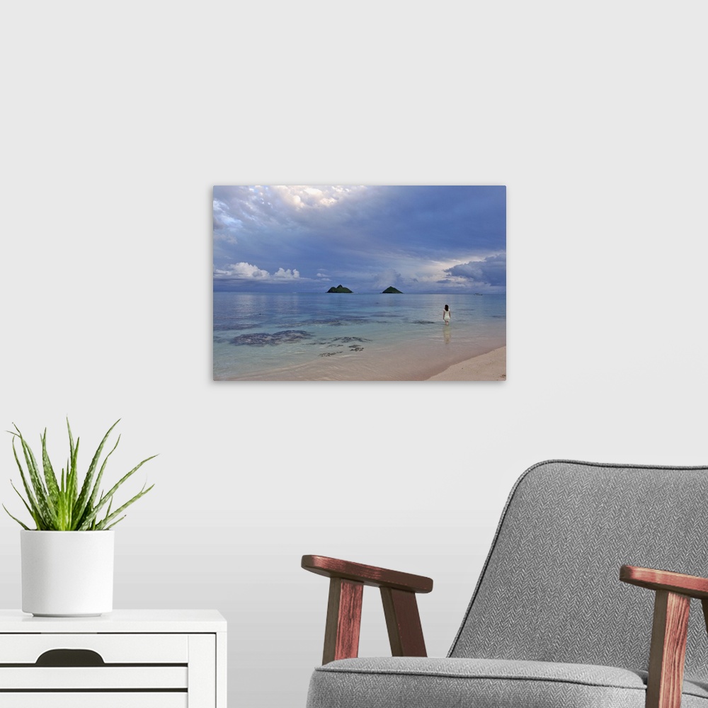 A modern room featuring Hawaii, Oahu, Lanikai, A Woman Wades In The Water At The Beach
