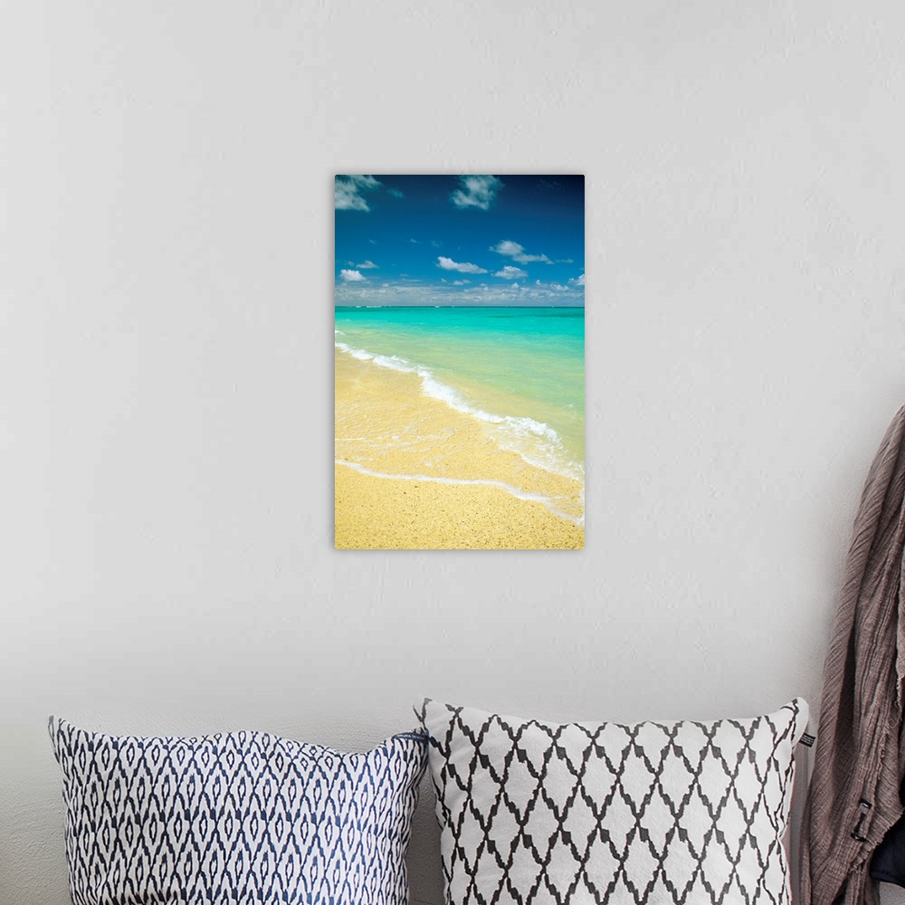 A bohemian room featuring Vertical photo on canvas of crystal clear waves washing up on shore of a beach.