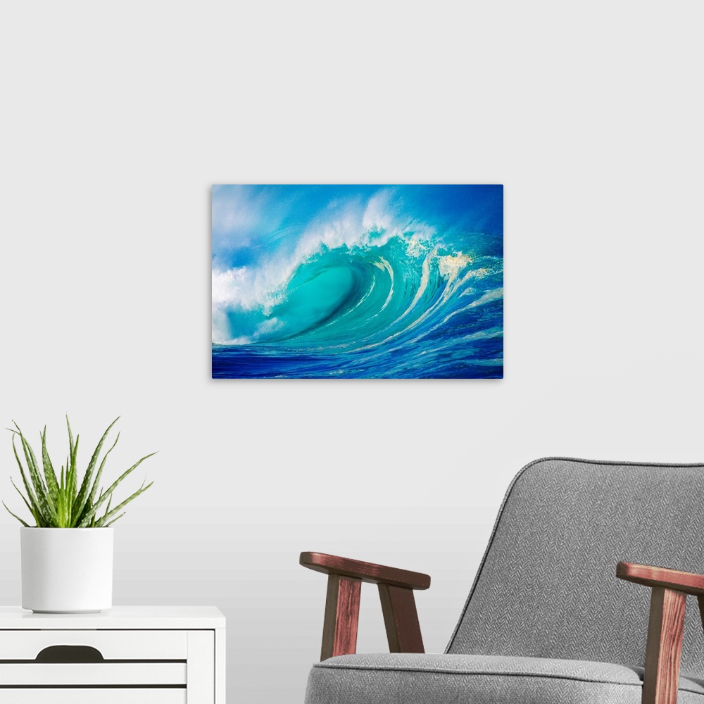 A modern room featuring Big photograph showcases a giant wave after it has curled and now prepares to break against the s...