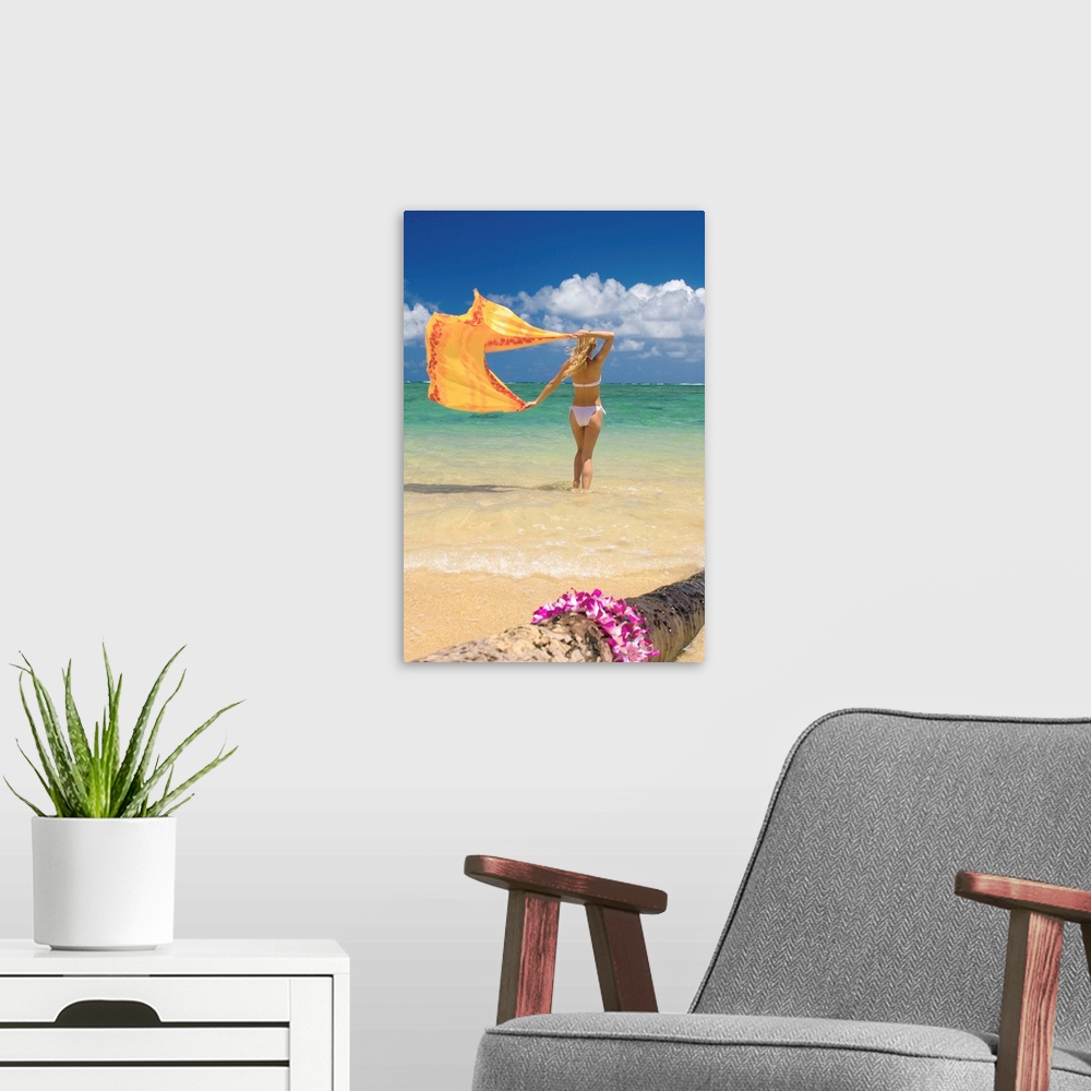 A modern room featuring Hawaii, Oahu, Punaluu Beach, Young Woman Standing In Ocean Holding Pareo