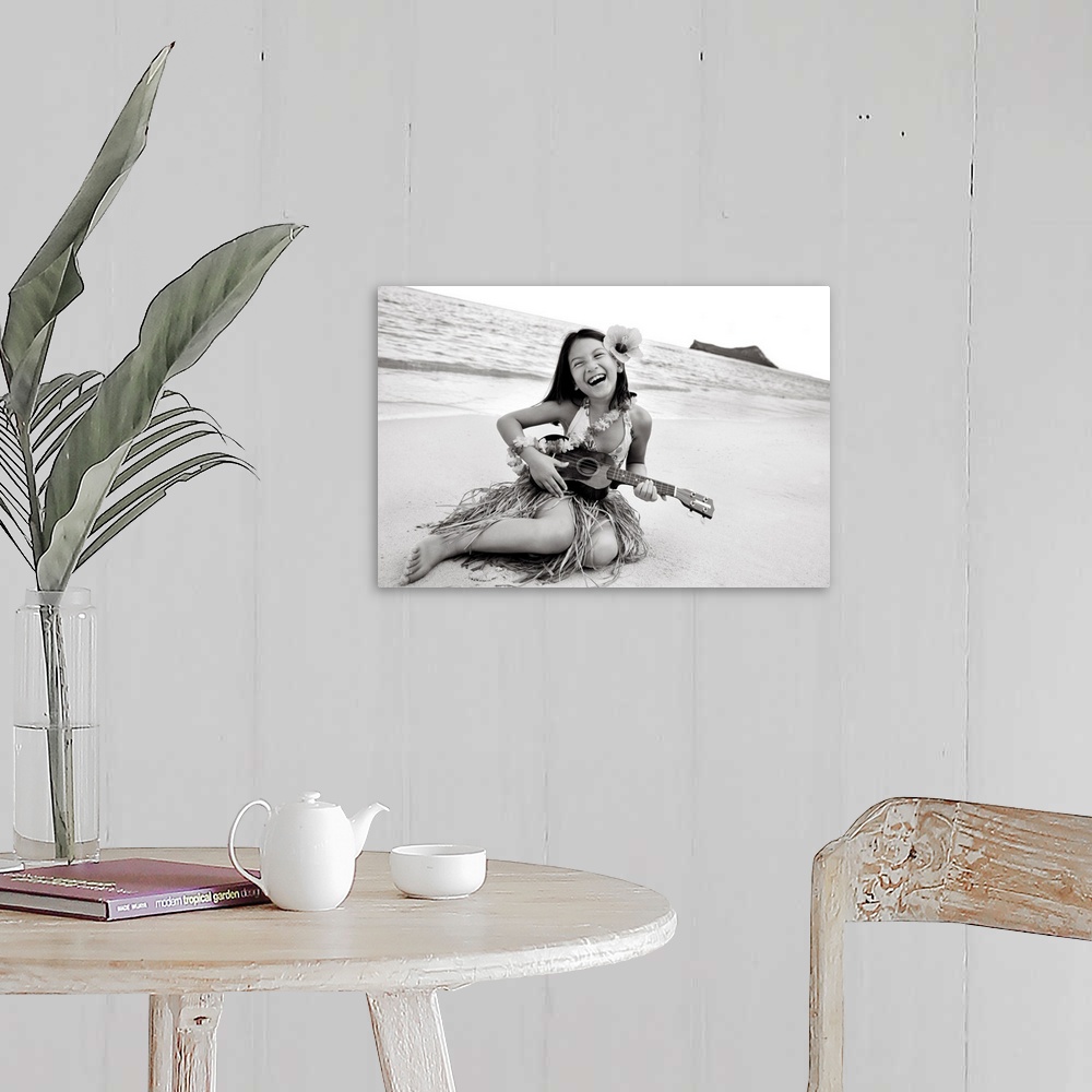 A farmhouse room featuring Hawaii, Oahu, Young Girl Smiling And Playing Ukulele On The Beach In A Hula Skirt