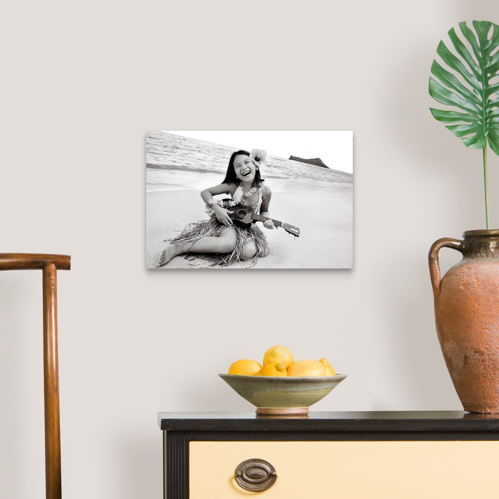 A traditional room featuring Hawaii, Oahu, Young Girl Smiling And Playing Ukulele On The Beach In A Hula Skirt