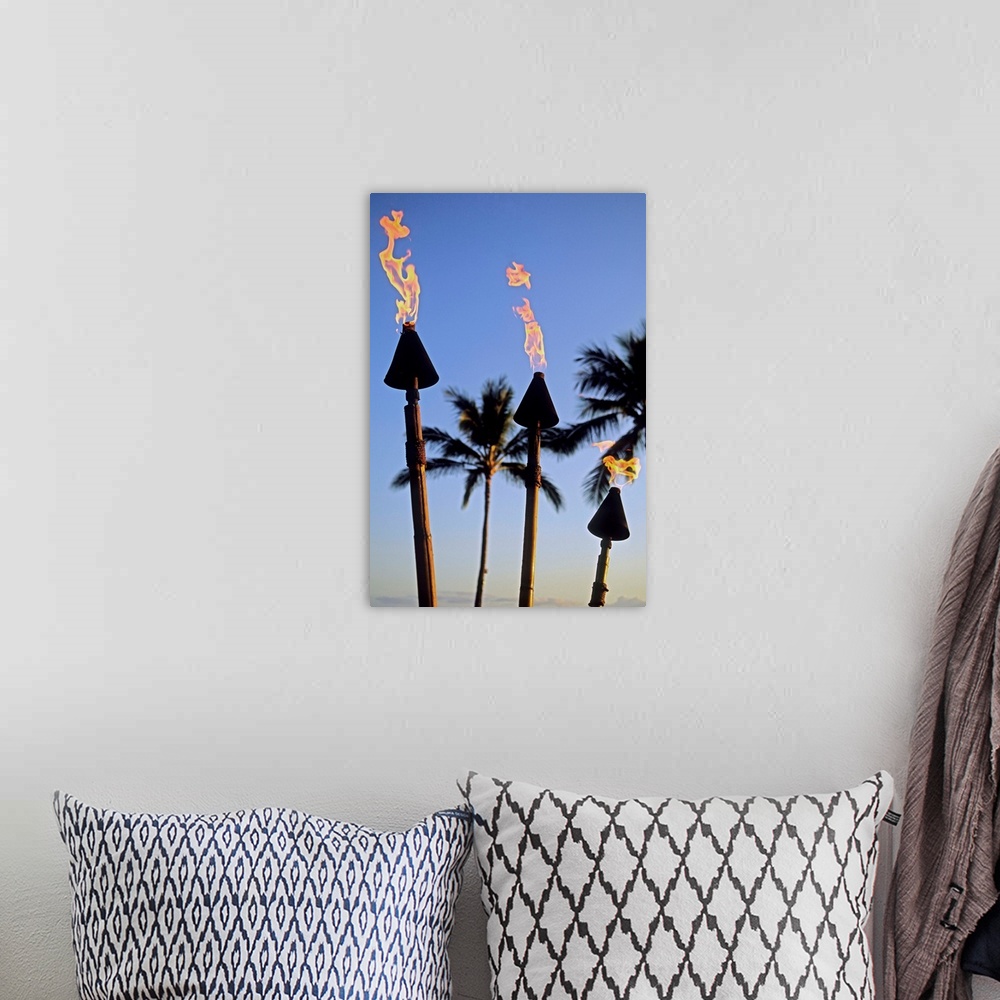 A bohemian room featuring Hawaii, Tiki Torches Lit At Dusk, Palm Trees And Blue Sky