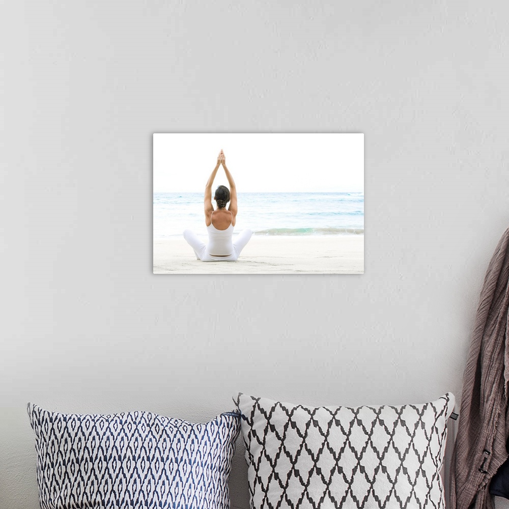A bohemian room featuring Hawaii, Woman Meditating On Ocean Shore