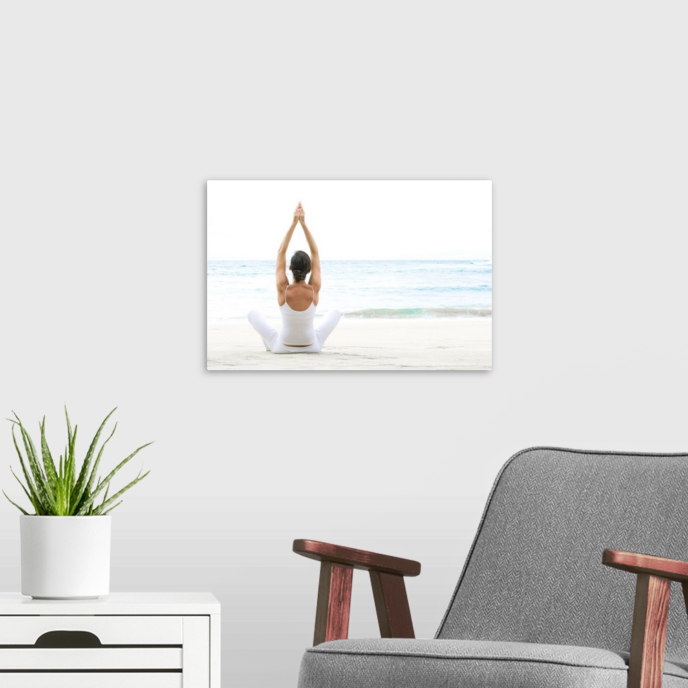 A modern room featuring Hawaii, Woman Meditating On Ocean Shore