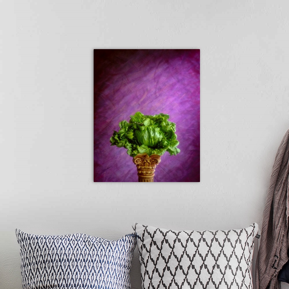 A bohemian room featuring Head of Iceberg lettuce with wrapper leaves on a pedestal