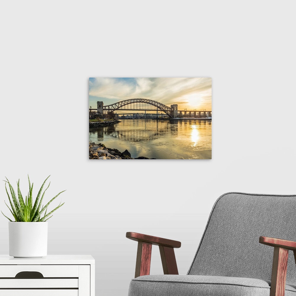 A modern room featuring Hell Gate And Rfk Triboro Bridges At Sunset, Ralph Demarco Park; Queens, New York, United States ...