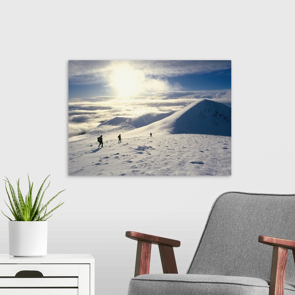 A modern room featuring Hikers On A Mountaintop In The Snow; Scotland