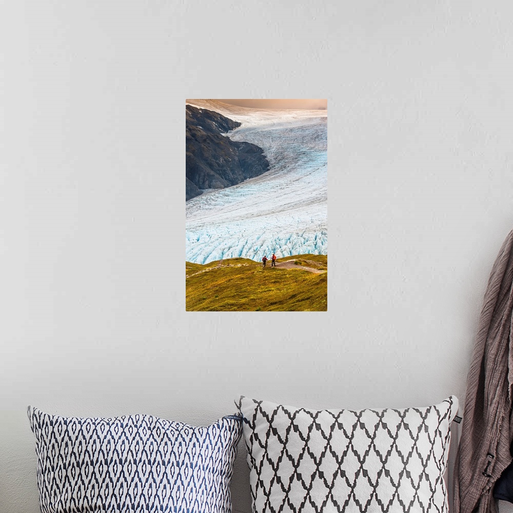 A bohemian room featuring A man and woman hiking down the Harding Icefield Trail with Exit Glacier in the background, Kenai...