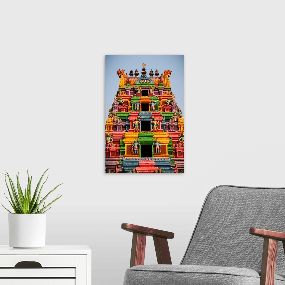 A modern room featuring Hindu temple gopuram.