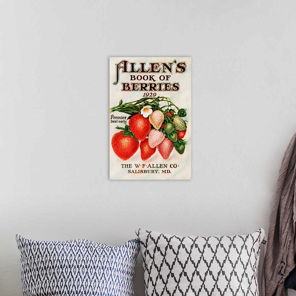 A bohemian room featuring Historic Allen's Book of Berries with illustration of strawberries from 20th century