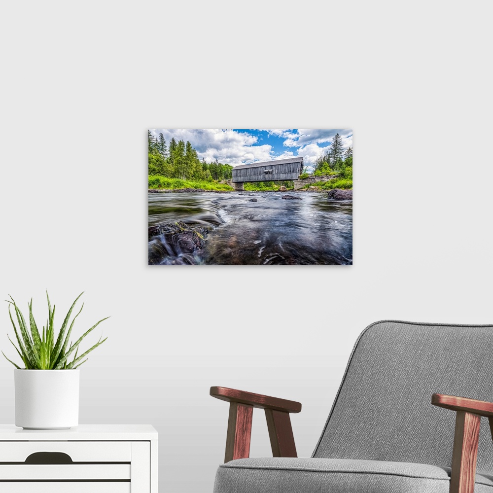 A modern room featuring Historic covered bridge over a shallow stream; Saint John, New Brunswick, Canada