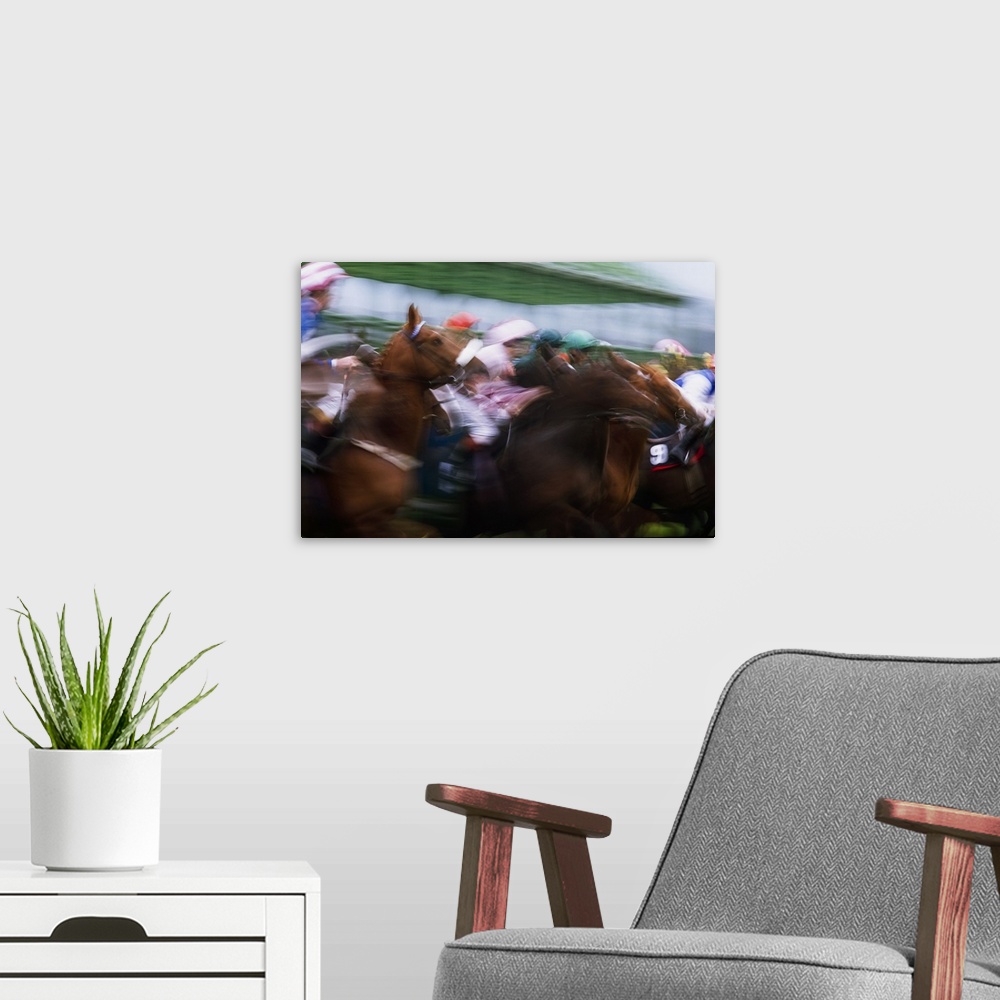 A modern room featuring Horses Breaking From The Stalls at a Race