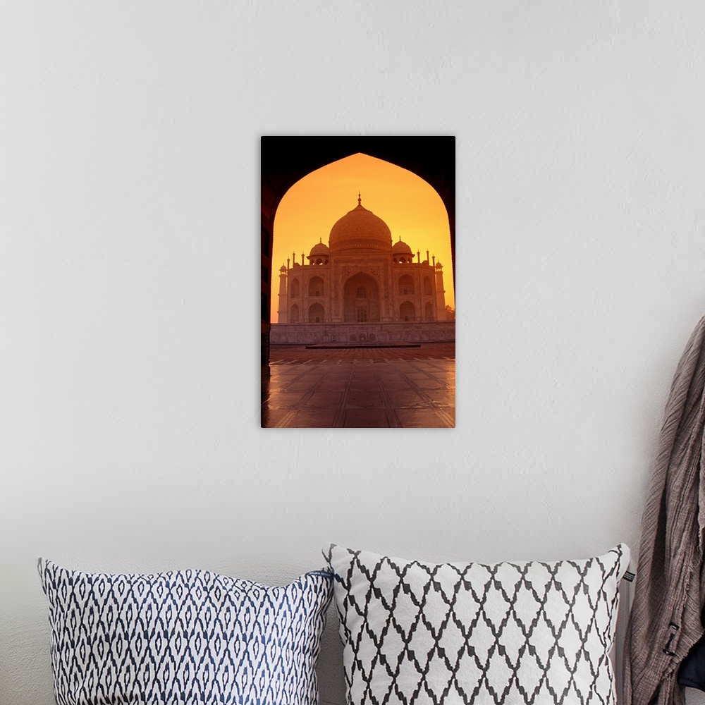 A bohemian room featuring India, Agra, View Of Taj Mahal Through Archway Of Adjacent Building