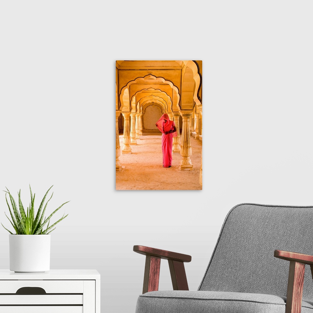 A modern room featuring India, Rajasthan, Jaipur, Amber Fort Temple, Woman In Bright Pink