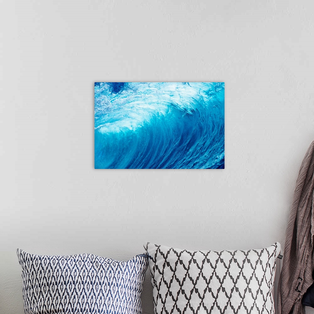 A bohemian room featuring Up-close photograph of tube created by huge swell.