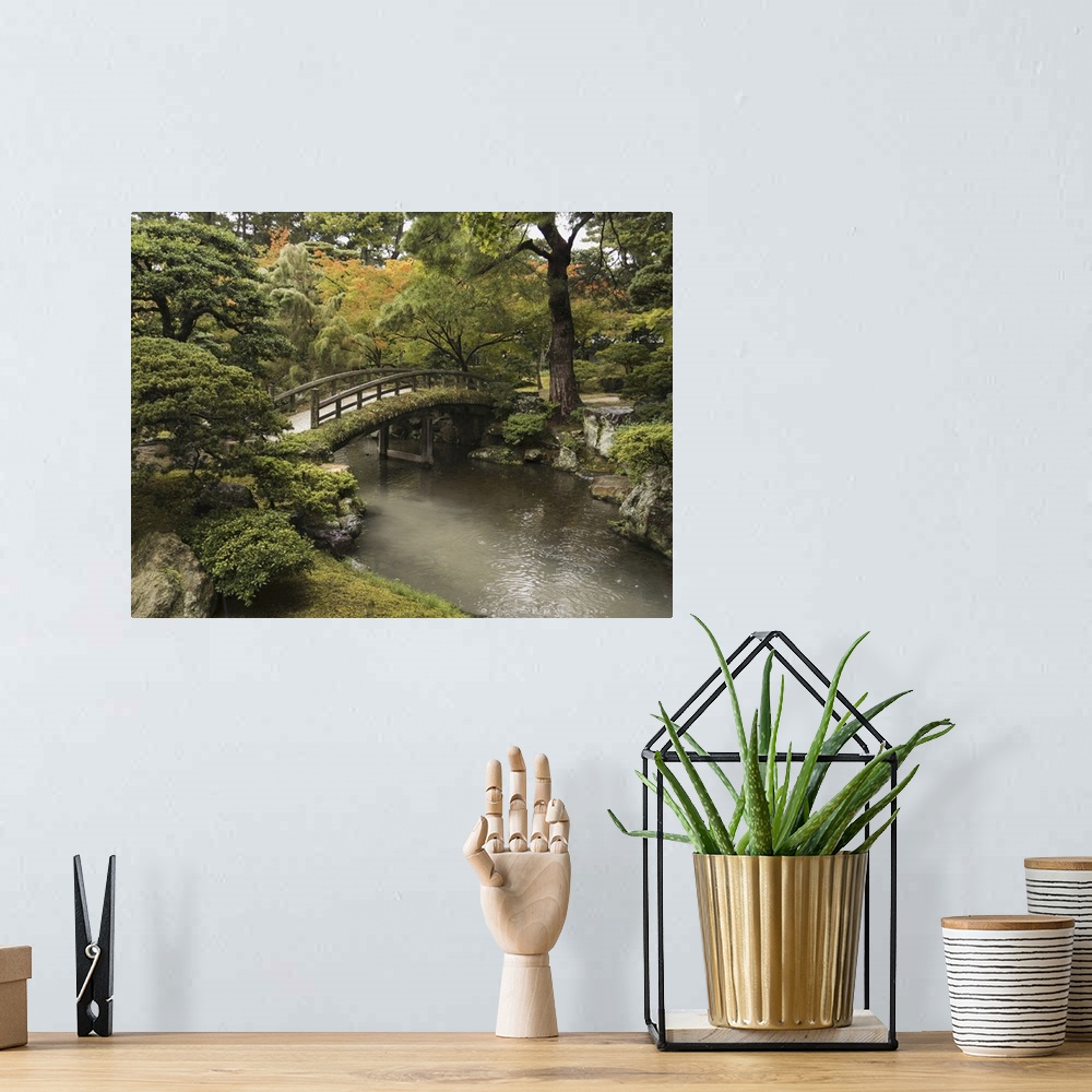 A bohemian room featuring Japanese Stone Bridge Across A Stream In A Park, Kyoto, Japan