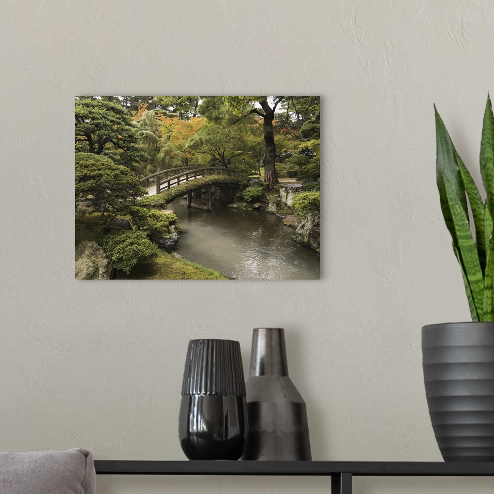 A modern room featuring Japanese Stone Bridge Across A Stream In A Park, Kyoto, Japan