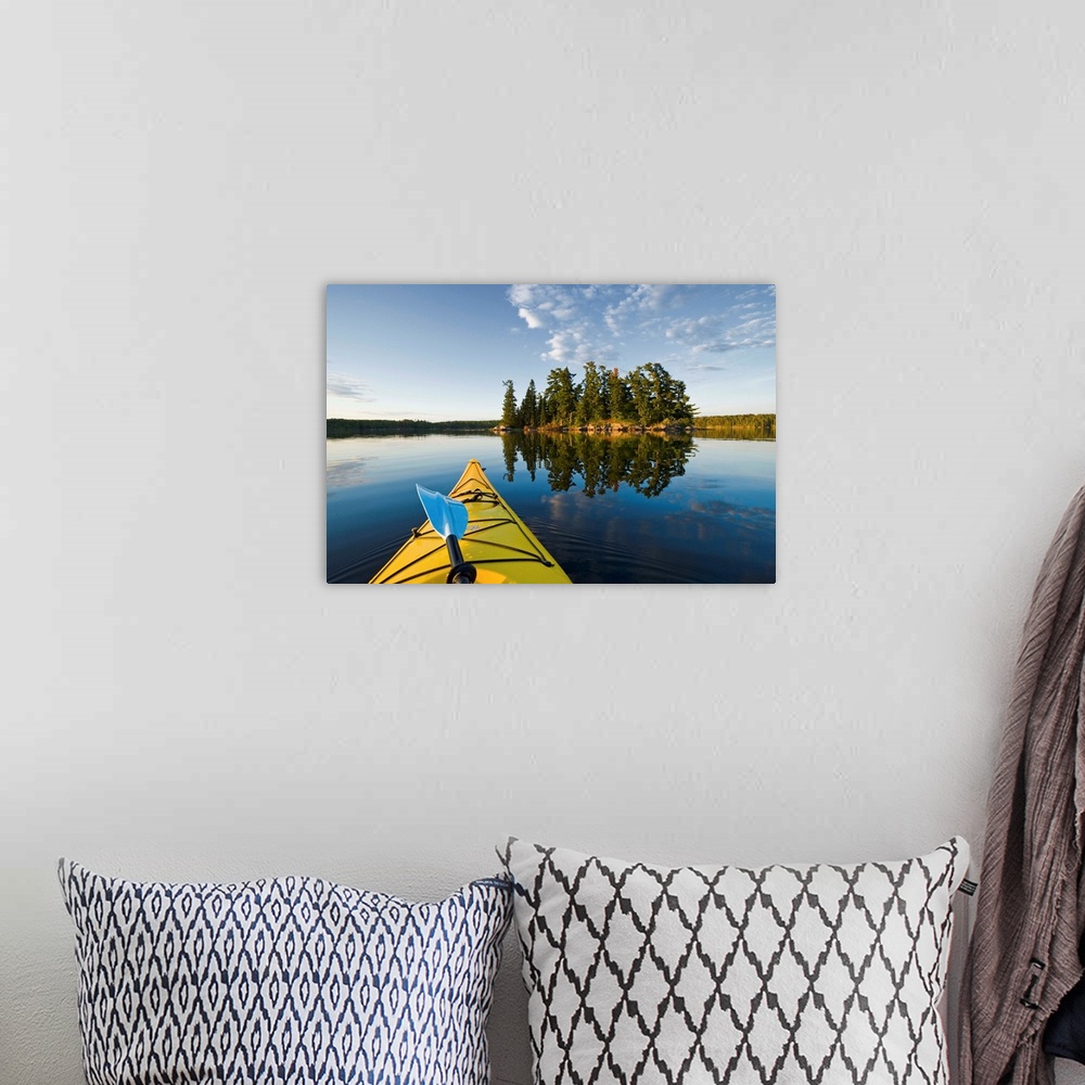 A bohemian room featuring Kayak On Lake In Northwestern Ontario, Lake Of The Woods, Ontario, Canada