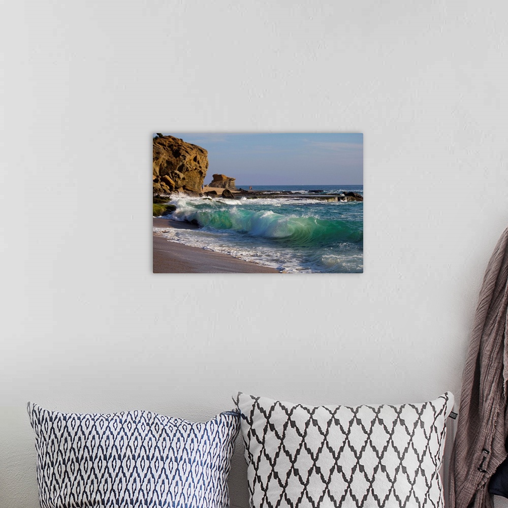 A bohemian room featuring Laguna beach shore break and waves.
